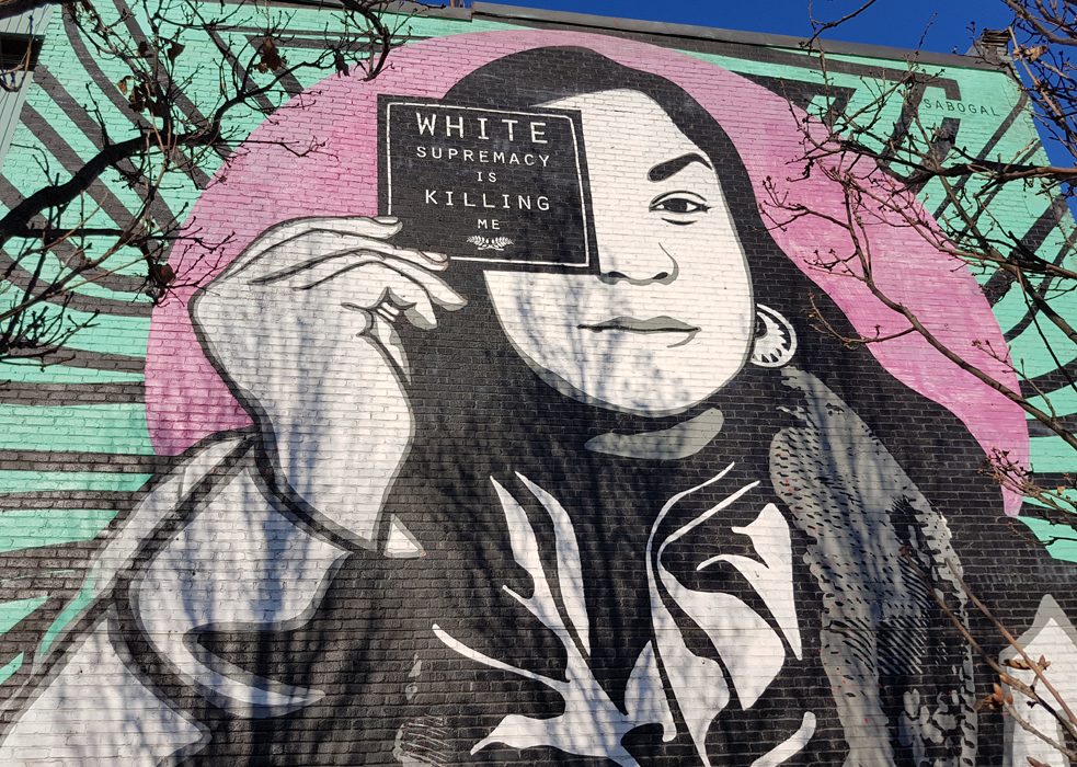 Mural on the wall of 4604, Rue Saint-Antoine Ouest, Montreal "White supremacy is killing me" by Jessica Sabogal